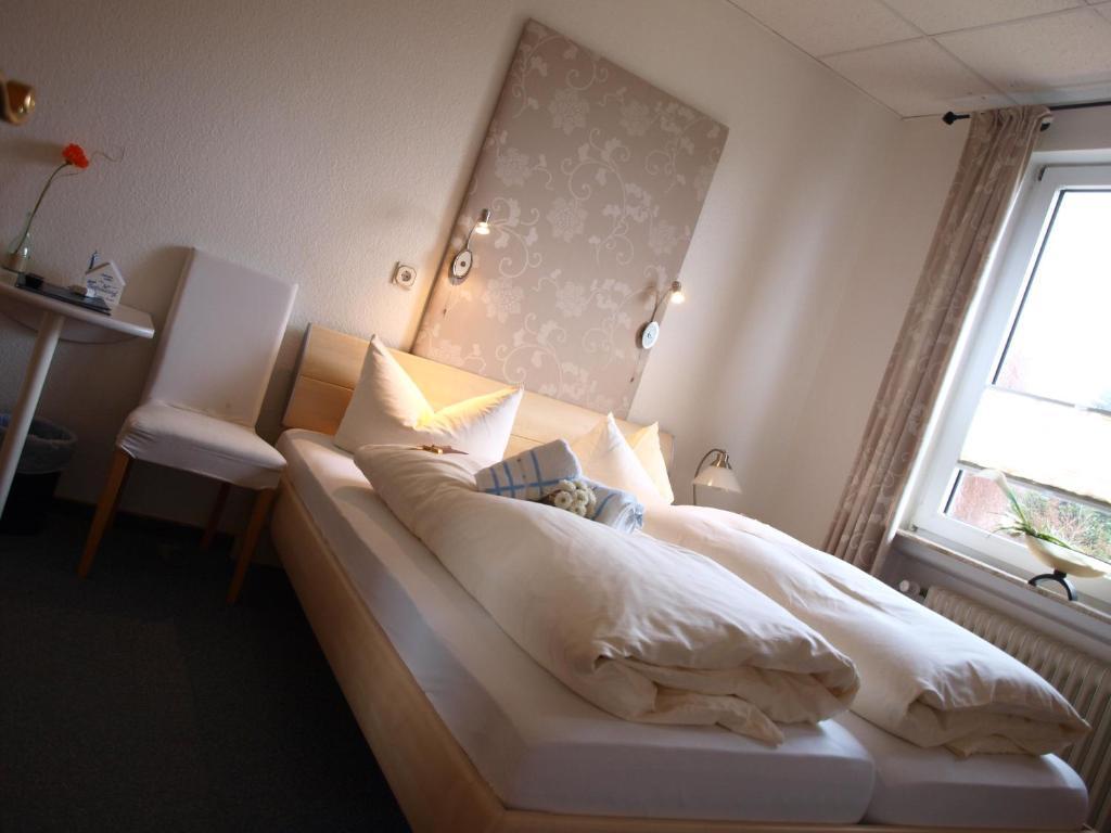 נורדן Hotel Ostfriesland Garni חדר תמונה